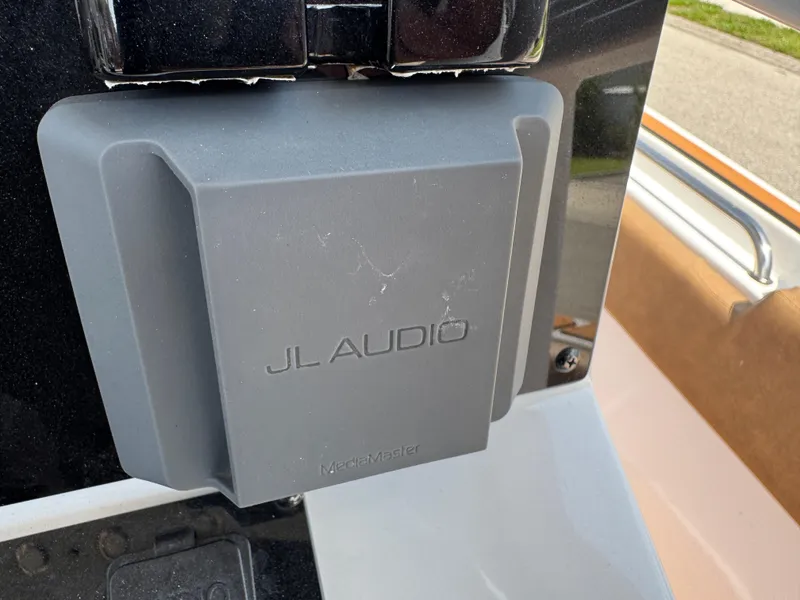 Slide: The Image of JL Audio speaker on 2022 Sea Hunt Ultra 234 boat. - 49