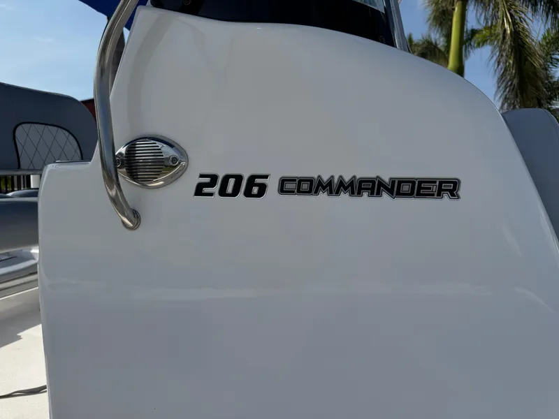 Slide: The Image of 2019 Sea Fox 206 Commander boat, close-up of model name on white surface. - 26