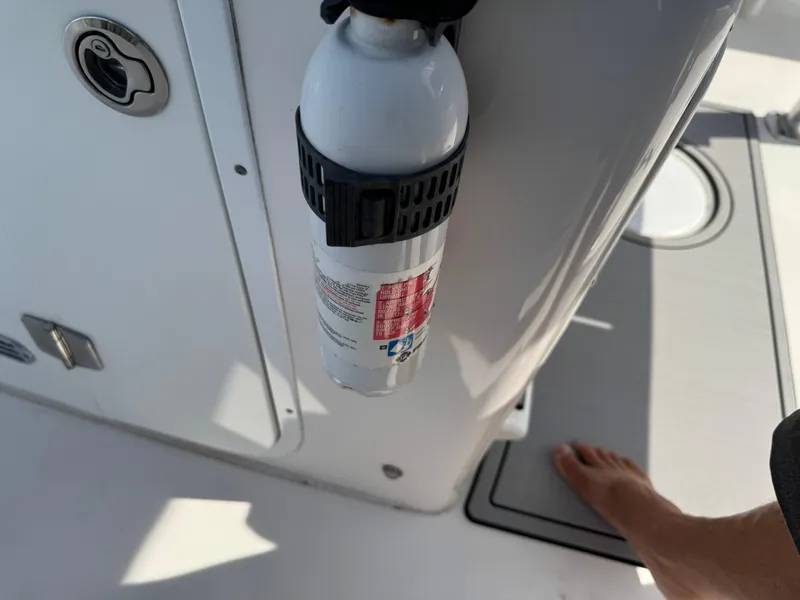 Slide: The Image of Fire extinguisher mounted on a 2019 Sea Fox 206 Commander boat deck. - 37