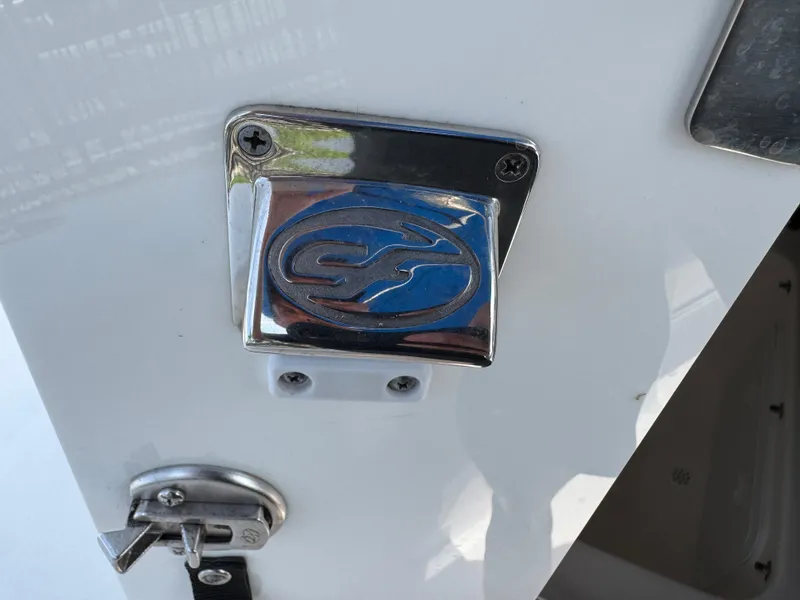 Slide: The Image of Chrome emblem on a 2019 Sea Fox 206 Commander boat. - 38