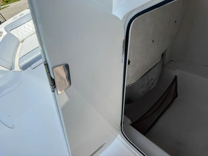 Slide: The Image of 2019 Sea Fox 206 Commander boat storage compartment with open hatch. - 44