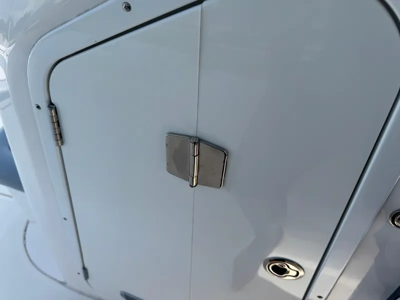 Slide: The Image of Hinged compartment door on a 2019 Sea Fox 206 Commander boat. - 45