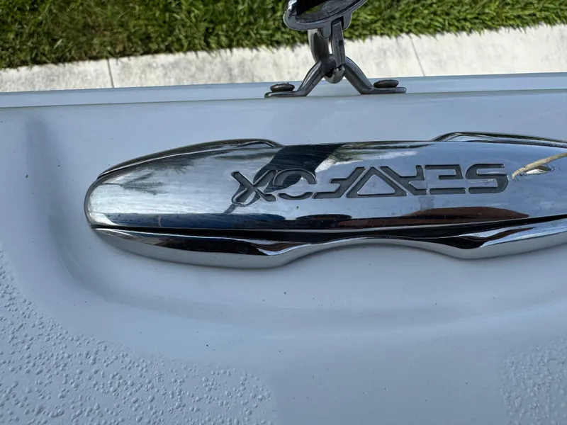 Slide: The Image of Chrome Sea Fox logo on 2019 Sea Fox 206 Commander boat. - 47