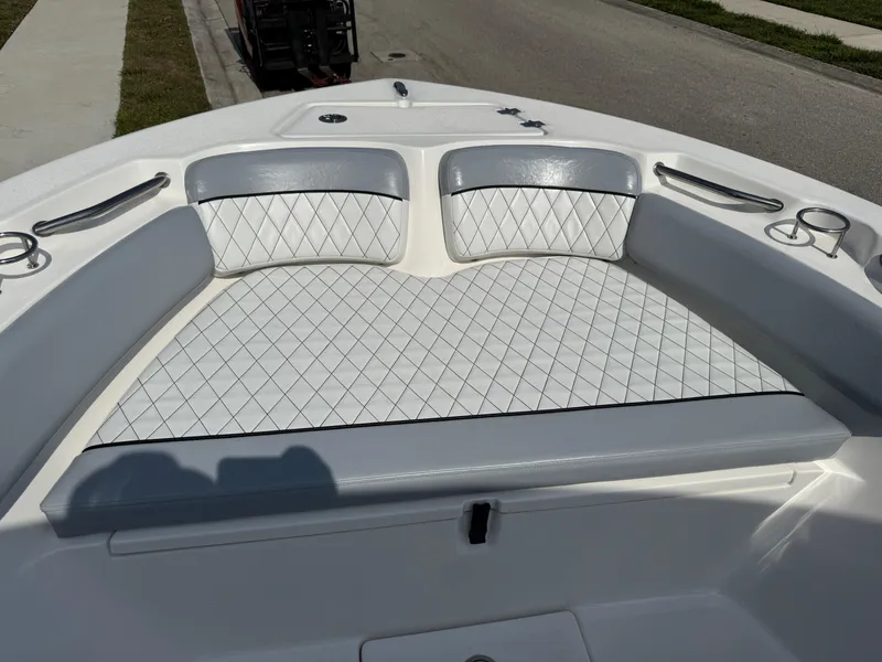 Slide: The Image of 2019 Sea Fox 206 Commander boat with diamond-stitched seating and cup holders. - 48
