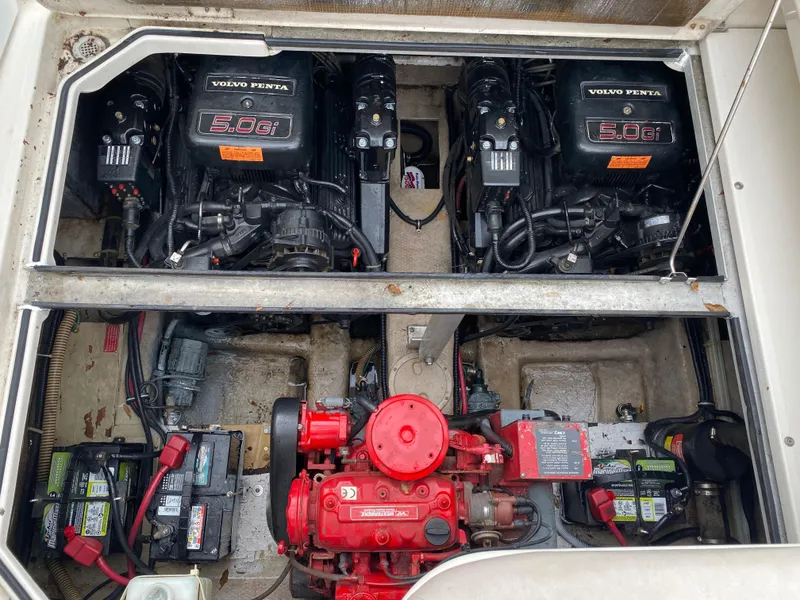 Slide: The Image of Engine compartment of 1998 Regal 292 Commodore with dual Volvo Penta 5.0 engines. - 27