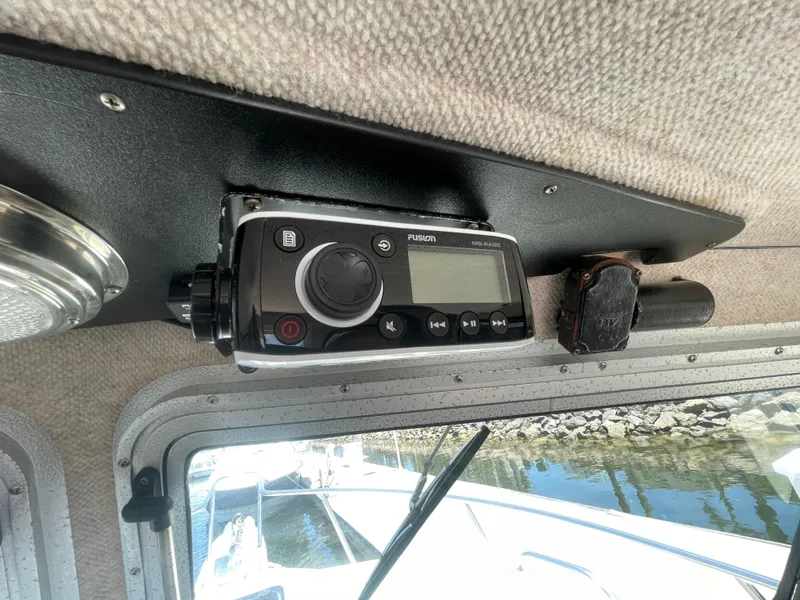 Slide: The Image of Interior of 2008 Parker 2520 XL Sport Cabin with mounted Fusion stereo system. - 24