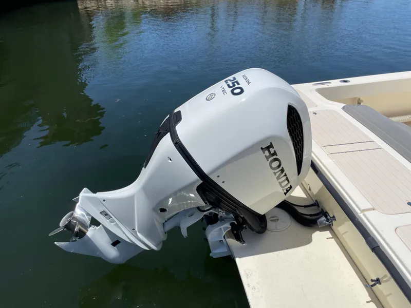 Slide: The Image of Honda 250 outboard motor on 2008 Parker 2520 XL Sport Cabin boat. - 31