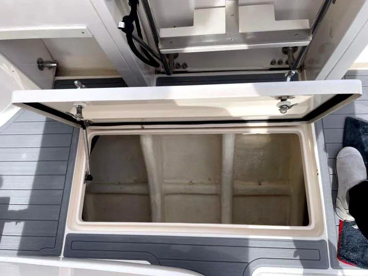 Slide: The Image of Open storage compartment on 2007 Intrepid 35 Walkaround boat deck. - 30