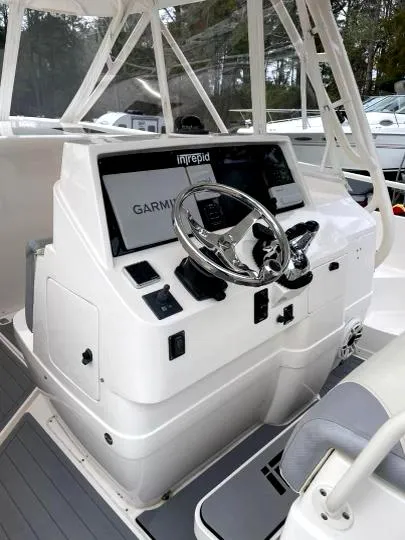 Slide: The Image of 2007 Intrepid 35 Walkaround boat helm with Garmin navigation system. - 4