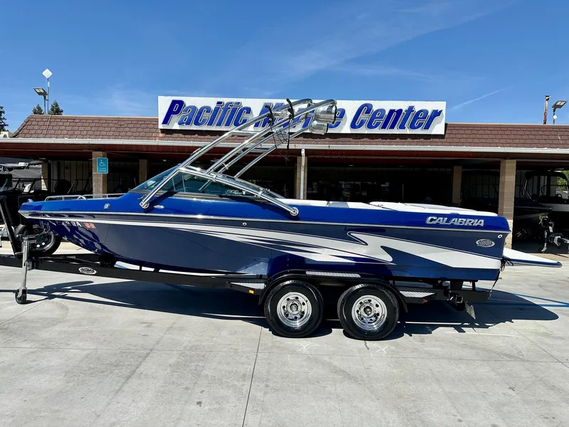 Slide: The Image of 2006 Calabria Boats Wakeboard Boat Cal-Air Pro-V in blue at Pacific Marine Center. - 1
