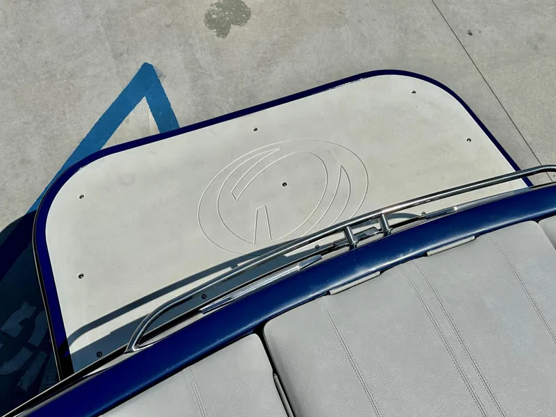 Slide: The Image of 2006 Calabria Boats Wakeboard Boat Cal-Air Pro-V swim platform and seating area. - 14