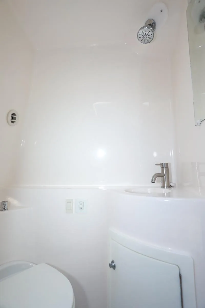 Slide: The Image of 2020 Regal 26 XO boat bathroom with shower and sink. - 41