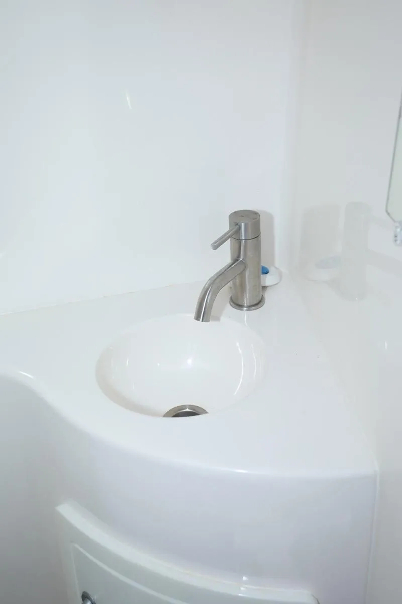 Slide: The Image of Modern sink in 2020 Regal 26 XO boat bathroom. - 42