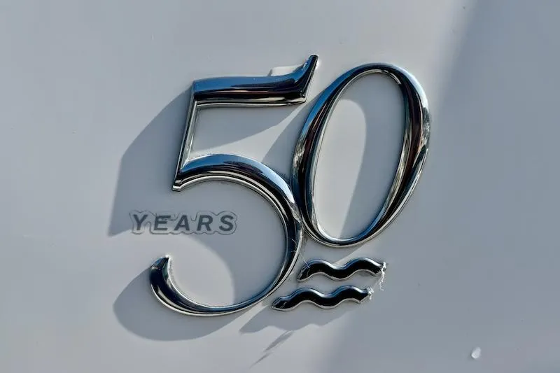 Slide: The Image of "50 Years" emblem on 2020 Regal 26 XO boat. - 8