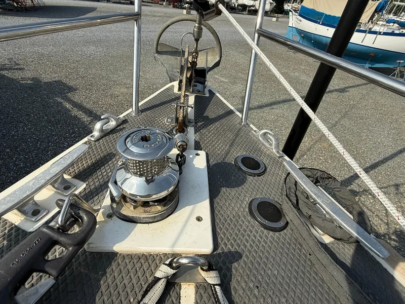 Slide: The Image of Deck view of a 1997 Westerly Oceanlord sailboat, featuring winch and steering components. - 5