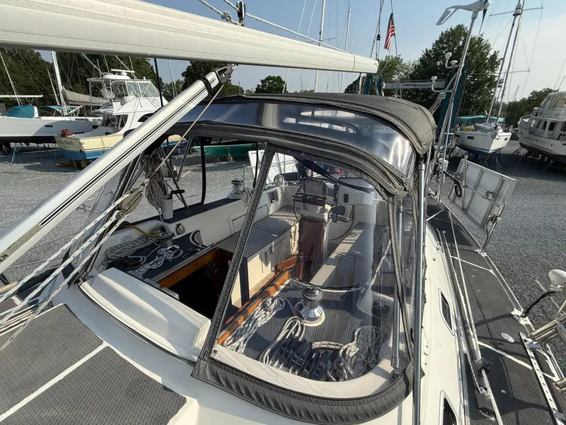Slide: The Image of 1997 Westerly Oceanlord sailboat with cockpit view, docked in a marina. - 9
