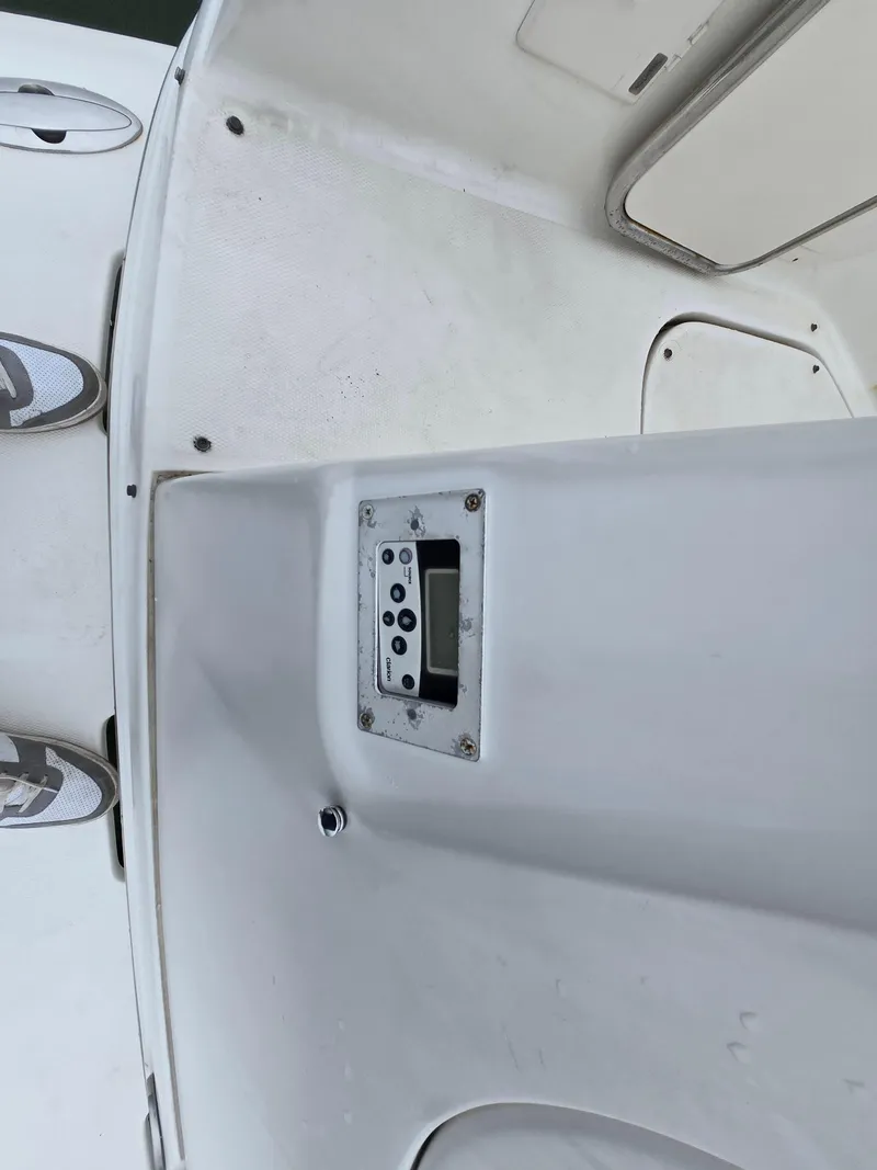 Slide: The Image of 2008 Chaparral 290 Signature boat dashboard with control panel. - 10
