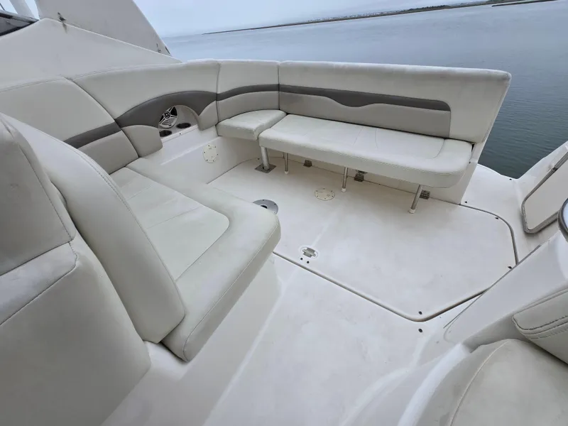 Slide: The Image of 2008 Chaparral 290 Signature boat interior with white seating and ocean view. - 17