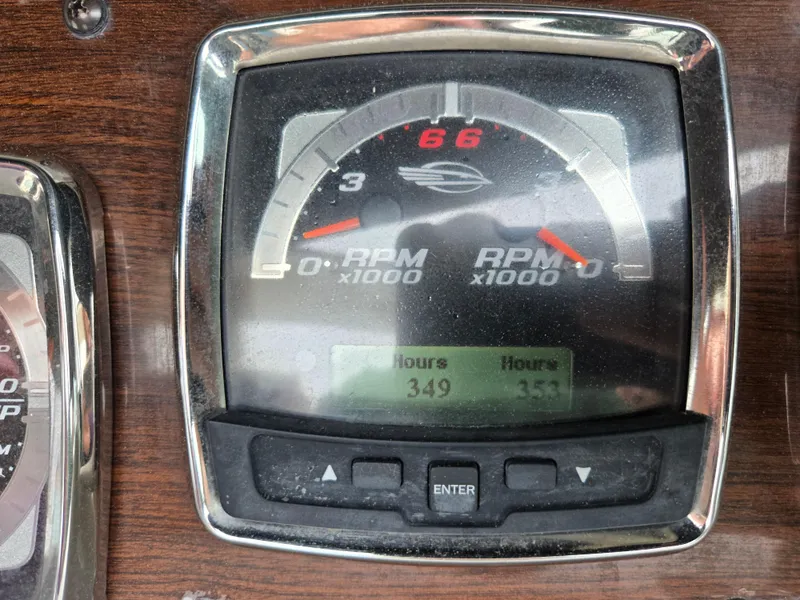 Slide: The Image of 2008 Chaparral 290 Signature RPM gauge displaying engine hours and RPM readings. - 33