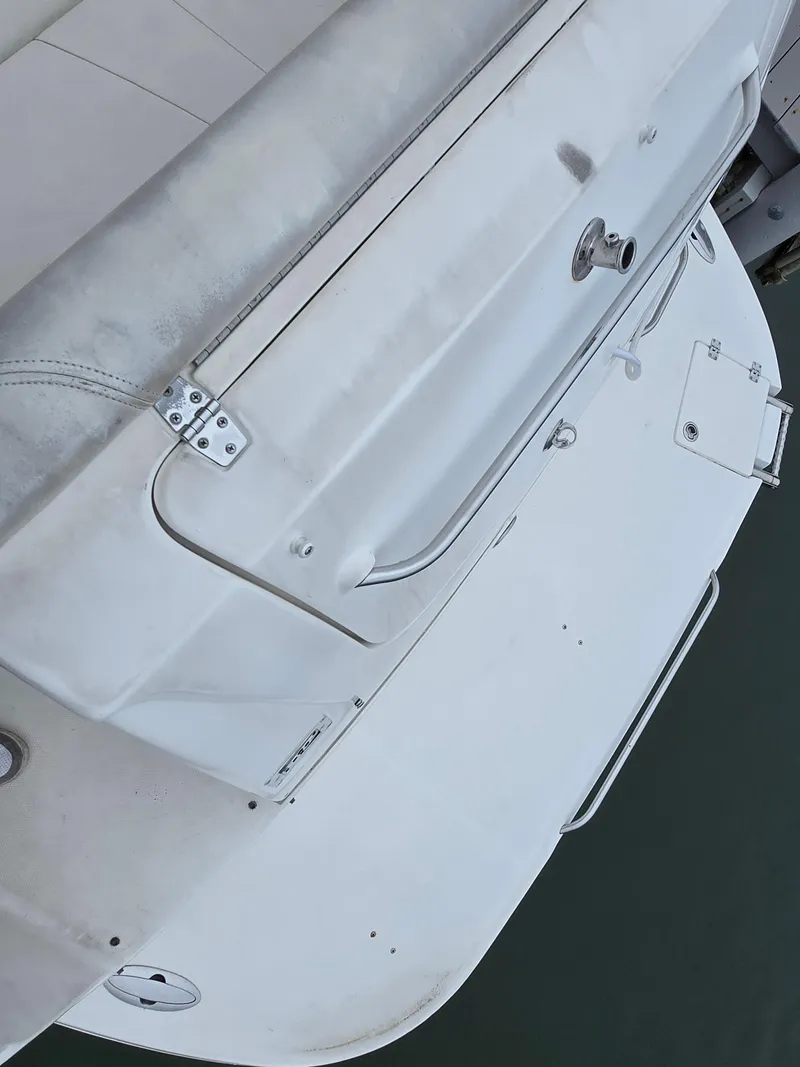 Slide: The Image of 2008 Chaparral 290 Signature boat propellers and outdrive in water. - 34