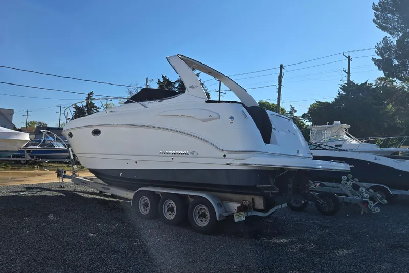 Slide: The Image of 2008 Chaparral 290 Signature boat on trailer in outdoor setting. - 36