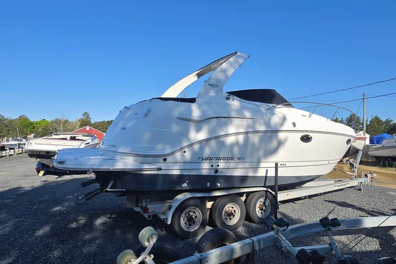 Slide: The Image of 2008 Chaparral 290 Signature boat on trailer in outdoor storage area. - 37