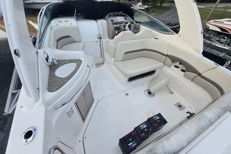 Slide: The Image of 2008 Chaparral 290 Signature boat interior with seating and control panel. - 38