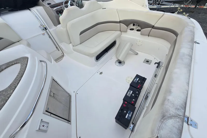 Slide: The Image of 2008 Chaparral 290 Signature boat interior with seating and battery compartment. - 39