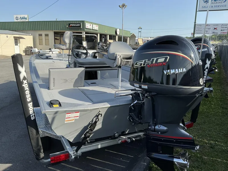 Slide: The Image of 2025 Xpress Xplorer Series XP20CC boat with Yamaha engine at dealership. - 9