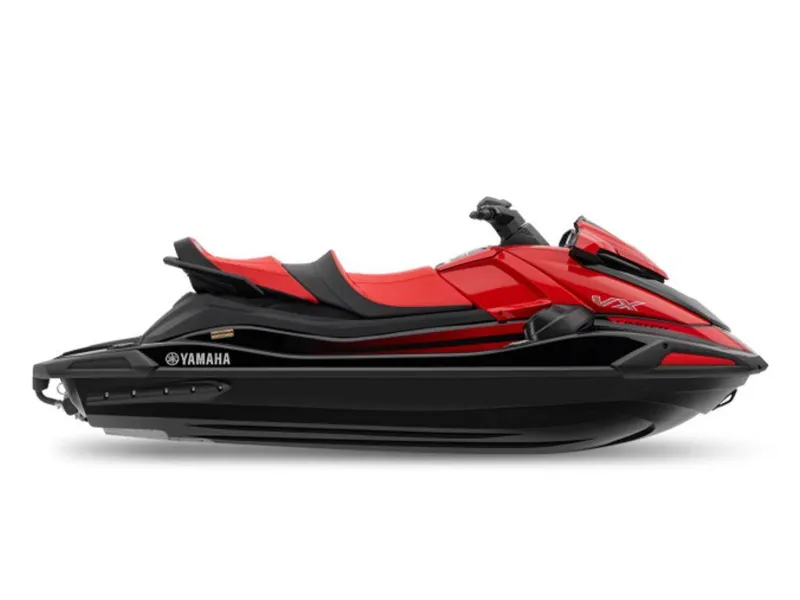 Slide: The Image of 2024 Yamaha VX® Limited jet ski, red and black design, side view. - 0