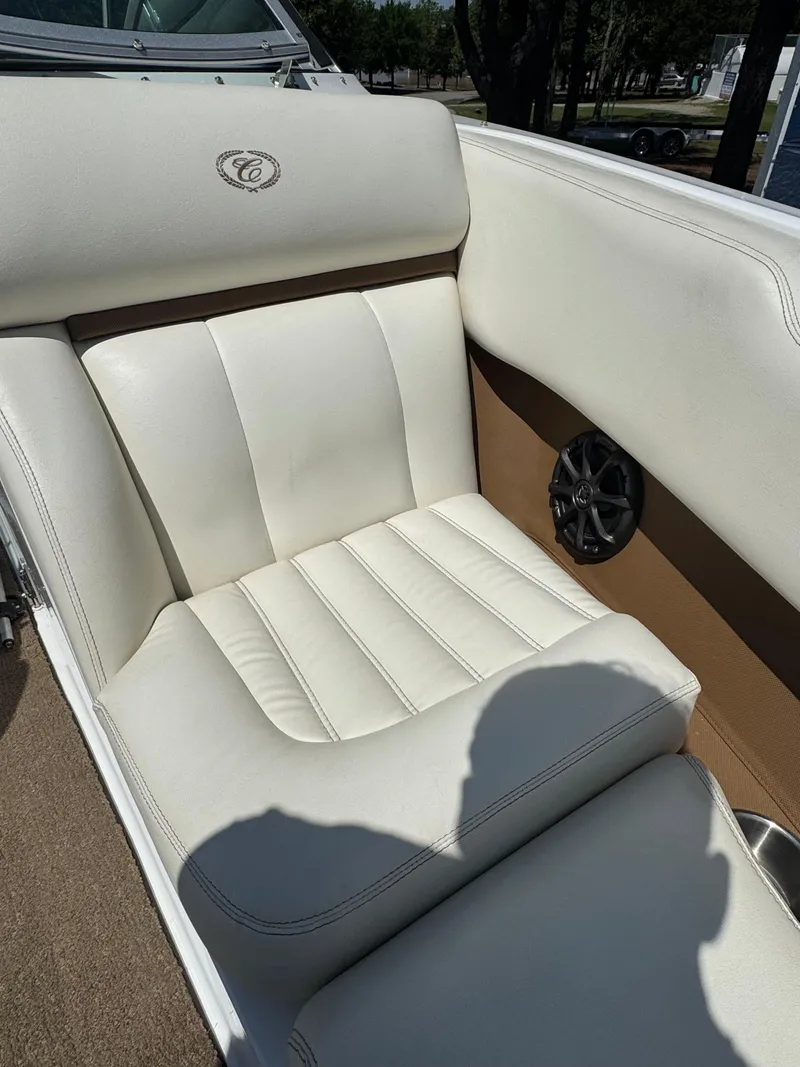 Slide: The Image of Luxurious white leather seat in a 2015 Cobalt R3 boat interior. - 10