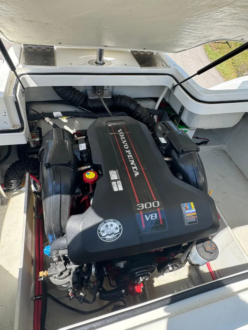 Slide: The Image of Volvo Penta 300 V8 engine in 2015 Cobalt R3 boat, open engine compartment. - 9
