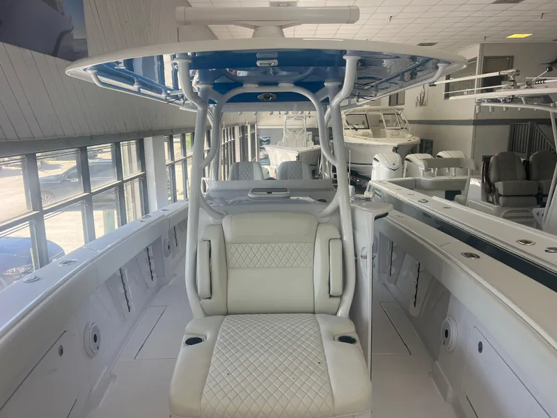 Slide: The Image of 2022 Jupiter 34 FS boat interior with white seating and modern design. - 3