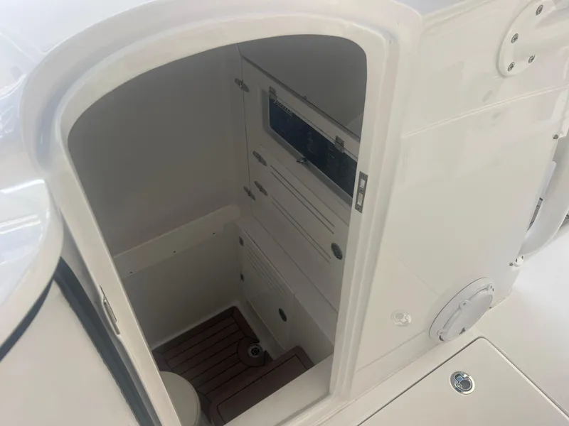 Slide: The Image of Interior cabin of 2022 Jupiter 34 FS boat, featuring storage compartments. - 9