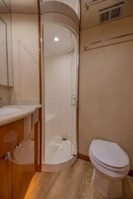 Slide: The Image of Bathroom interior of 2006 Hatteras 64 Motor Yacht with shower and toilet. - 48