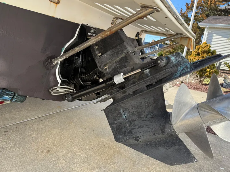 Slide: The Image of 2001 Silverhawk 24 Center Console boat propeller and stern drive detail. - 6