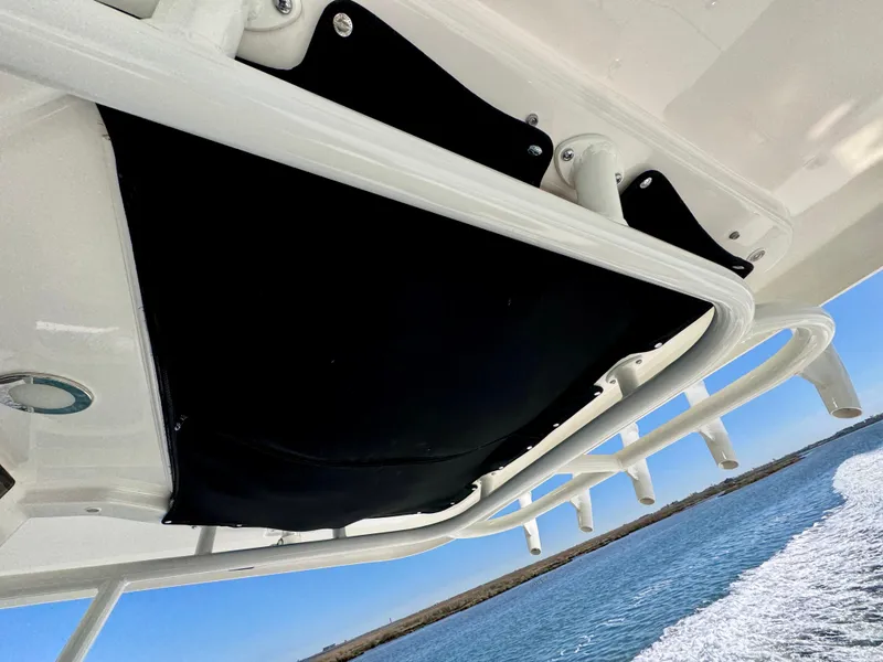 Slide: The Image of Boston Whaler 330 Outrage 2018 boat detail with ocean backdrop. - 36