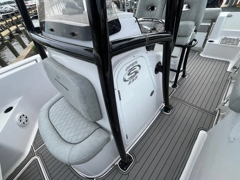 Slide: The Image of 2020 Sportsman Open 232 Center Console boat interior with seating and console details. - 11