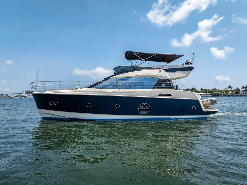 Slide: The Image of 2015 Beneteau Monte Carlo 5 yacht cruising on a sunny day. - 2