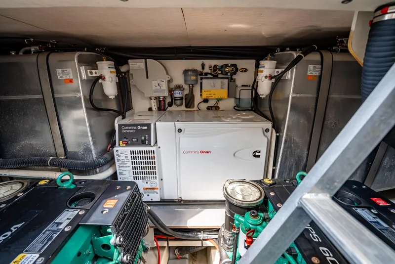 Slide: The Image of Engine room of 2015 Beneteau Monte Carlo 5 yacht with Cummins Onan generator. - 32