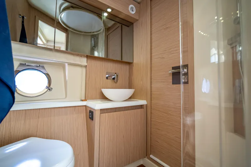 Slide: The Image of Luxurious bathroom interior of 2015 Beneteau Monte Carlo 5 yacht with modern fixtures. - 45