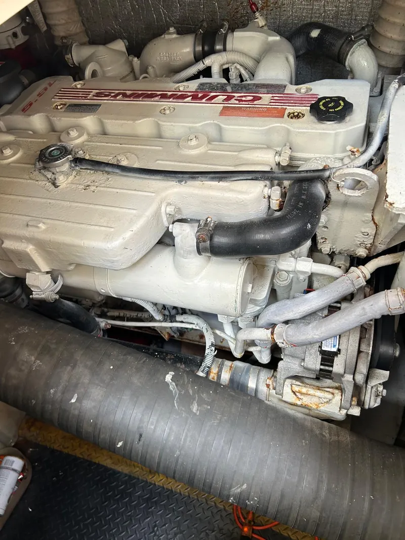 Slide: The Image of Engine compartment of a 2005 Rinker Fiesta Vee 410 boat. - 32