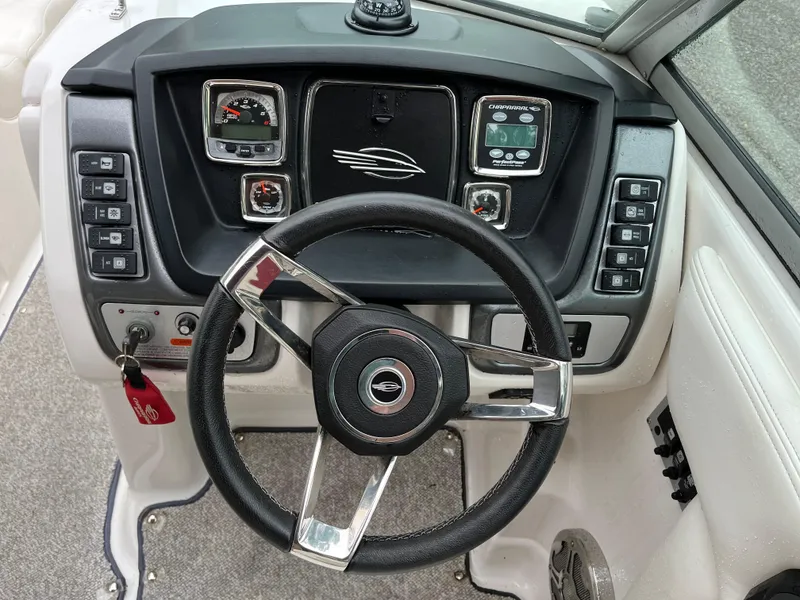 Slide: The Image of Steering wheel and dashboard of 2013 Chaparral 224 Xtreme boat. - 12