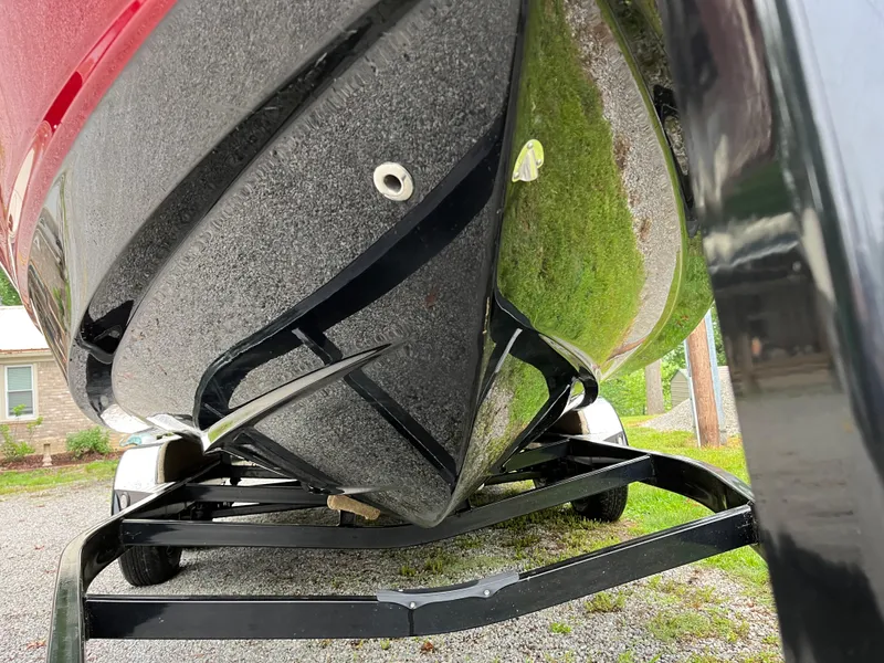 Slide: The Image of 2013 Chaparral 224 Xtreme boat hull on trailer, close-up view. - 27