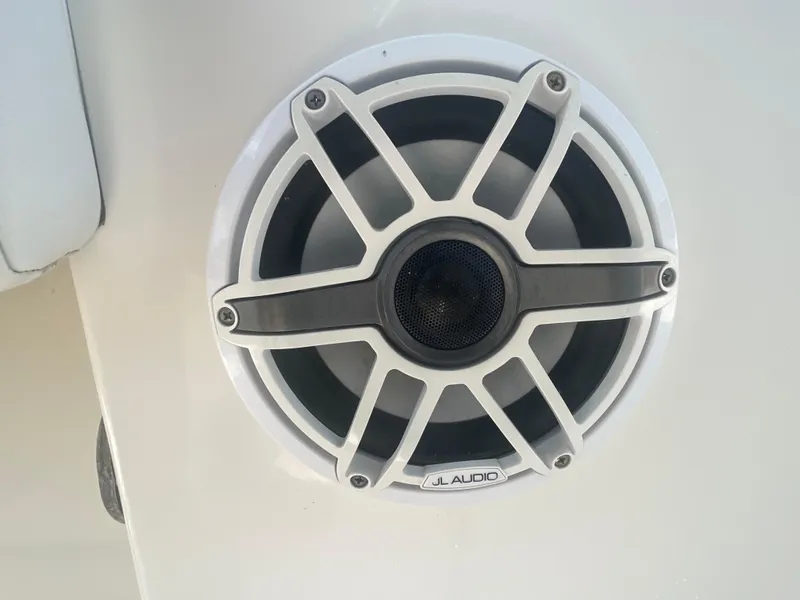 Slide: The Image of Speaker on 2020 Cobia 262 Center Console boat, featuring JL Audio design. - 13