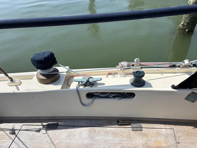Slide: The Image of Hinckley 36 Auxiliary Yawl deck detail with winch and cleat, 1955 model. - 18