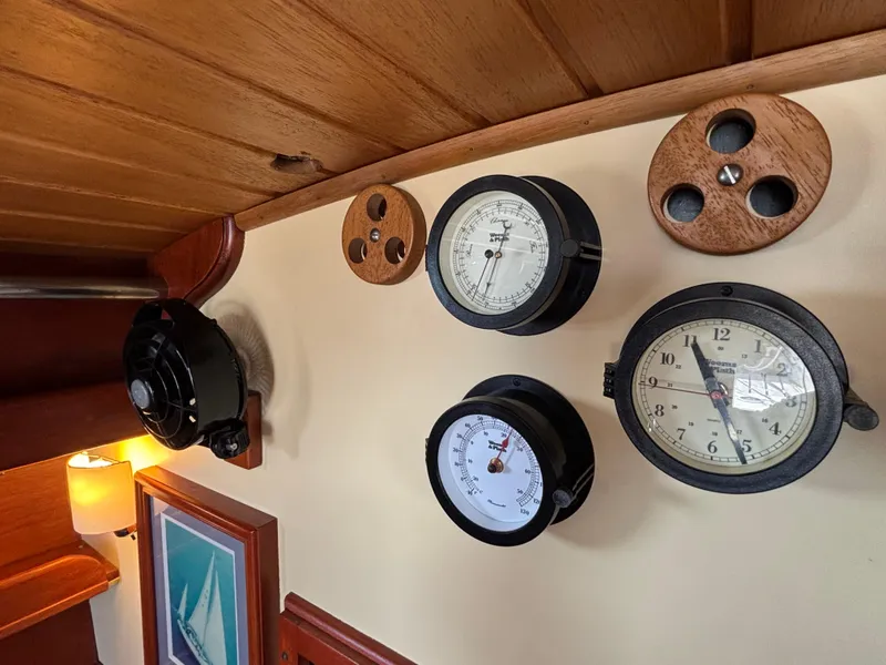 Slide: The Image of Vintage gauges and instruments inside a 1955 Hinckley 36 Auxiliary Yawl sailboat. - 36