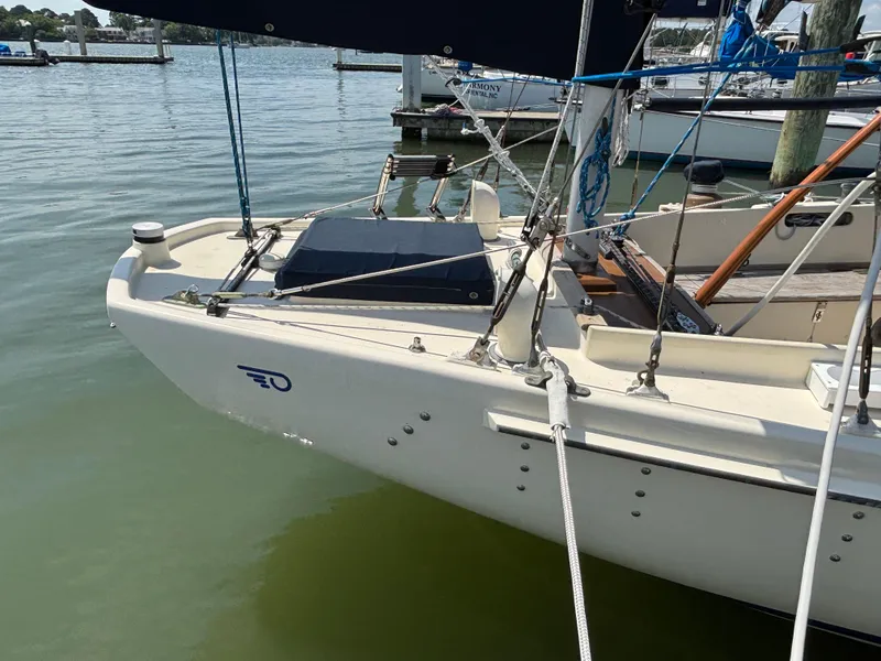 Slide: The Image of 1955 Hinckley 36 Auxiliary Yawl docked, showcasing classic design and rigging details. - 5