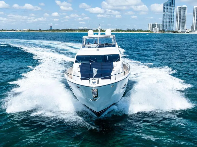 Slide: The Image of 2019 Sunseeker 86 Yacht cruising on blue ocean under clear sky. - 4