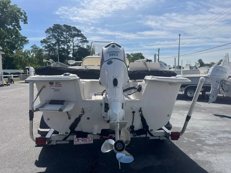 Slide: The Image of 2017 Carolina Skiff 178 DLV boat with Suzuki 90 outboard motor, parked on trailer. - 4